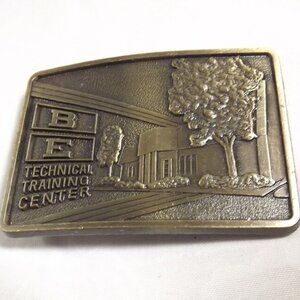 B E Technical Training Center Belt Buckle
